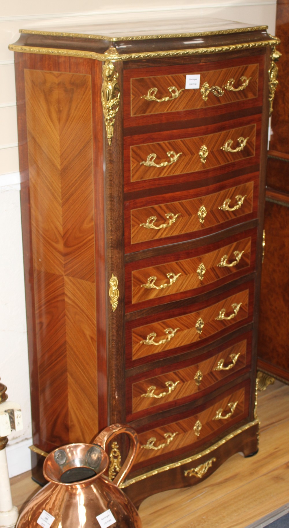 A Meuble Francais gilt metal mounted serpentine secretaire chest, W.66cm D.34cm H.122cm